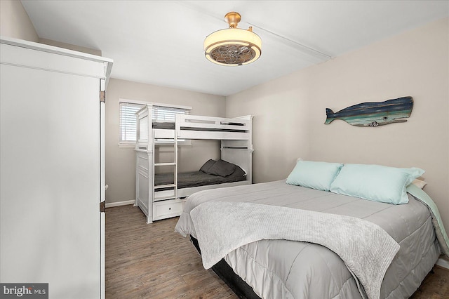 2901 Atlantic Ave Unit 101The, Towers, Ocean City, MD 21842 - bedroom featuring baseboards and wood finished floors