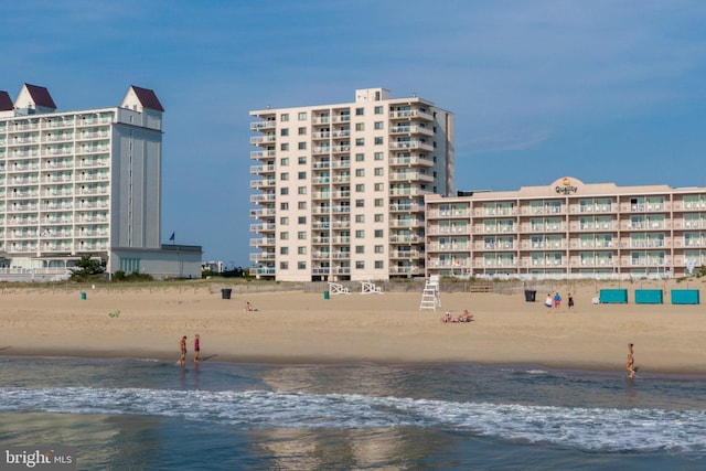 2901 Atlantic Ave Unit 101The, Towers, Ocean City, MD 21842 - view of building exterior with a water view and a view of the beach