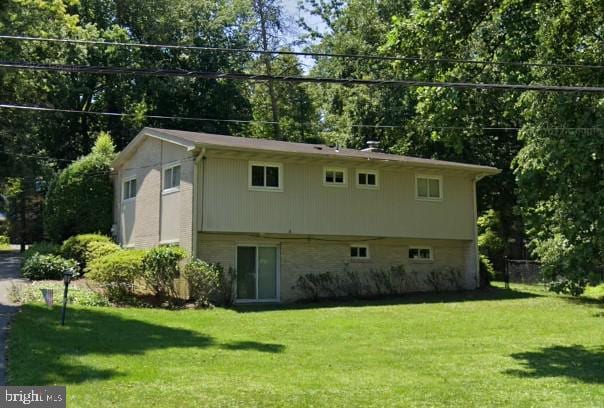 exterior space featuring a yard