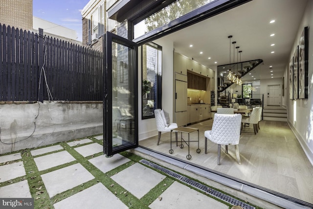 view of patio featuring fence