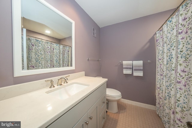 264 W Montgomery Ave Unit 305, Haverford, PA 19041 - full bathroom featuring vanity, toilet, tile patterned floors, baseboards, and a shower with curtain
