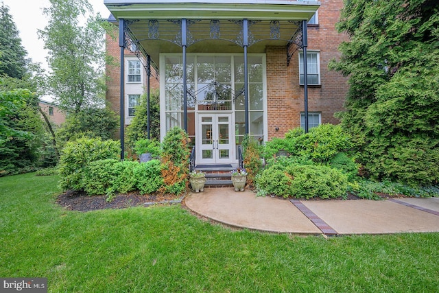 264 W Montgomery Ave Unit 305, Haverford, PA 19041 - entrance to property featuring french doors, a yard, and brick siding
