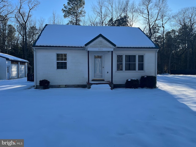 view of front facade with an outbuilding