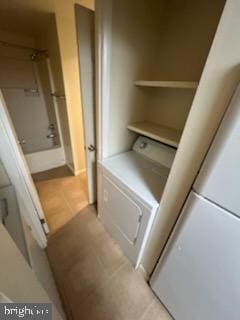 laundry room with washer / clothes dryer and laundry area