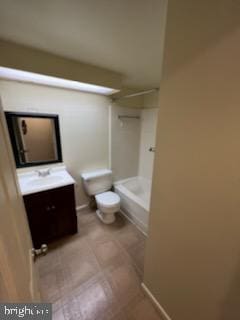 bathroom featuring shower / tub combination, toilet, vanity, and baseboards