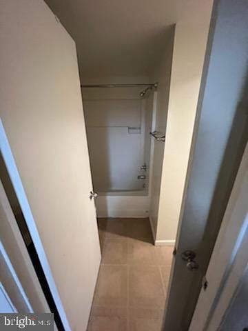 bathroom featuring tile patterned floors and shower / bathing tub combination