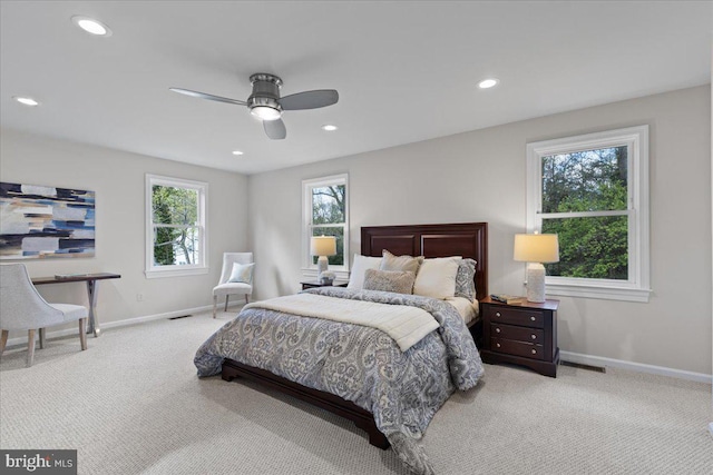bedroom with recessed lighting, carpet floors, visible vents, and baseboards