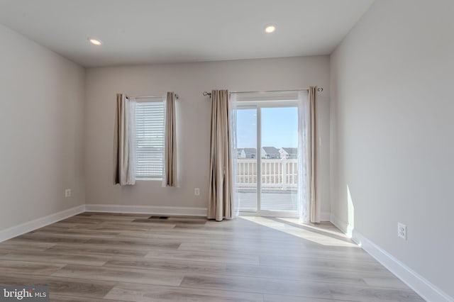 35416 Wright Way, Millsboro, DE 19966 - spare room with baseboards, light wood-style flooring, visible vents, and recessed lighting