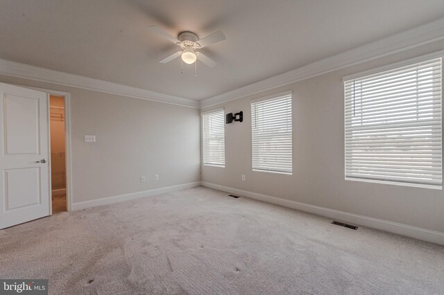 35416 Wright Way, Millsboro, DE 19966 - spare room featuring visible vents, crown molding, baseboards, carpet flooring, and ceiling fan