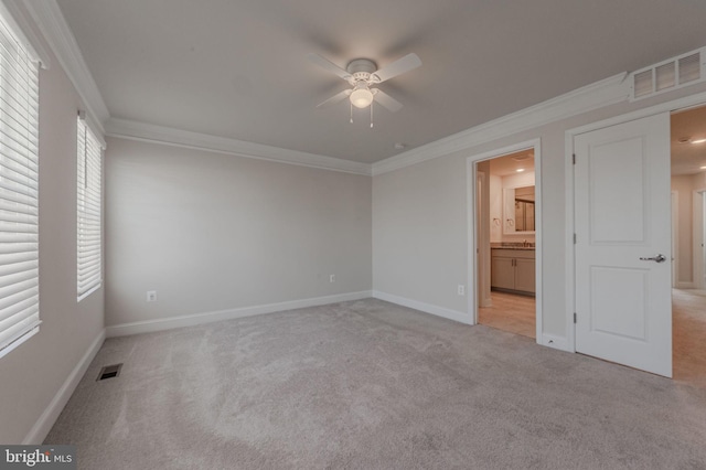 35416 Wright Way, Millsboro, DE 19966 - unfurnished bedroom with visible vents, crown molding, and light colored carpet