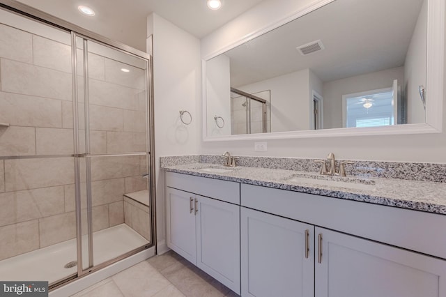 35416 Wright Way, Millsboro, DE 19966 - bathroom featuring double vanity, a sink, visible vents, and a stall shower