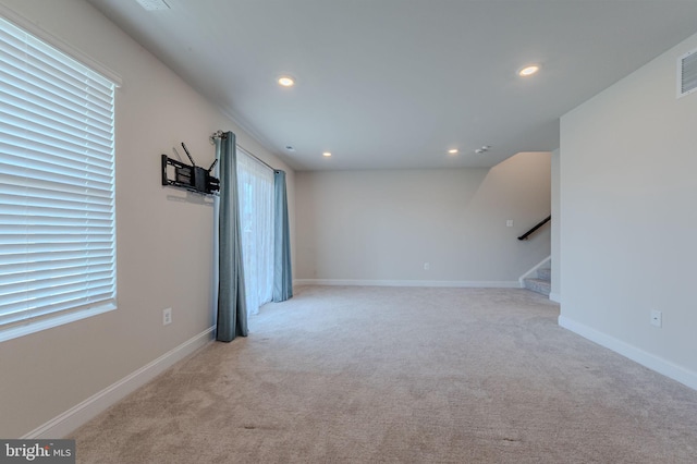 35416 Wright Way, Millsboro, DE 19966 - unfurnished living room with baseboards, carpet flooring, stairs, and recessed lighting