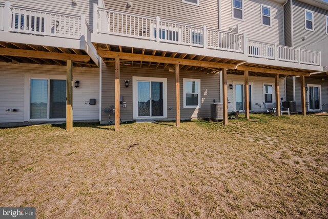 35416 Wright Way, Millsboro, DE 19966 - back of house featuring a lawn, central AC unit, and a deck