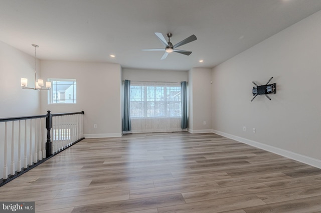 35416 Wright Way, Millsboro, DE 19966 - empty room with plenty of natural light, recessed lighting, and ceiling fan with notable chandelier