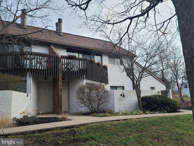 view of front of home featuring stucco siding