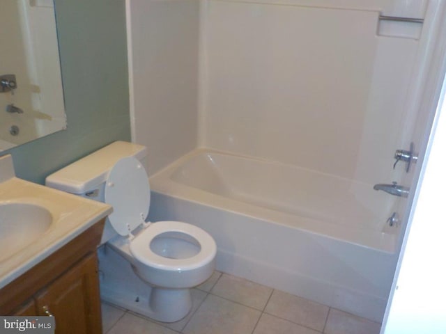 bathroom with tile patterned floors, tub / shower combination, toilet, and vanity