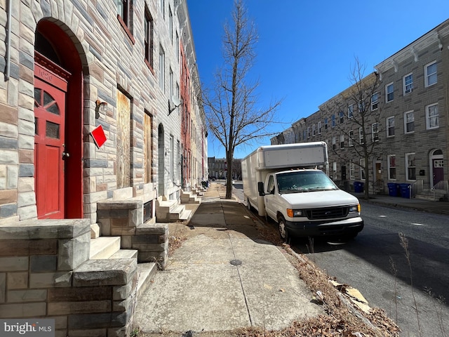 view of home's exterior with stone siding