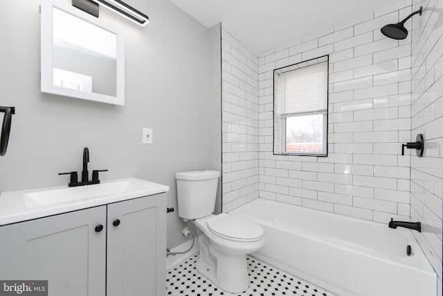 full bath with toilet, bathtub / shower combination, vanity, and tile patterned flooring