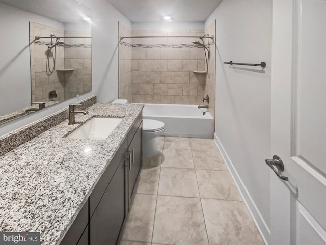 bathroom with tile patterned floors, toilet, shower / washtub combination, baseboards, and vanity