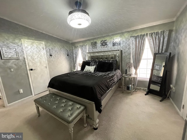 carpeted bedroom with baseboards and ornamental molding