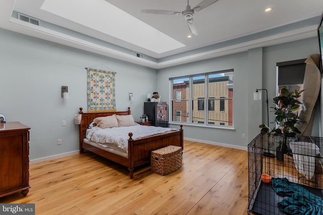 bedroom with recessed lighting, visible vents, baseboards, and light wood-style floors