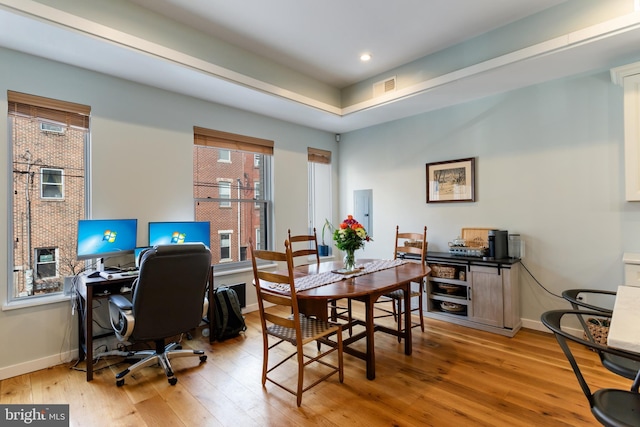 office with visible vents, recessed lighting, light wood-type flooring, and baseboards