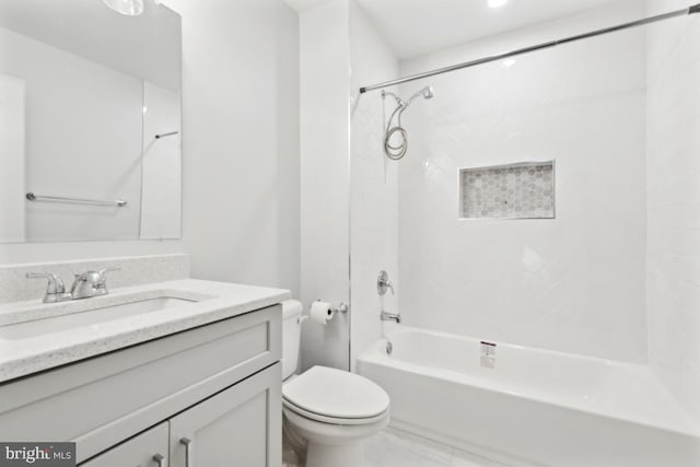 full bathroom with bathing tub / shower combination, toilet, and vanity