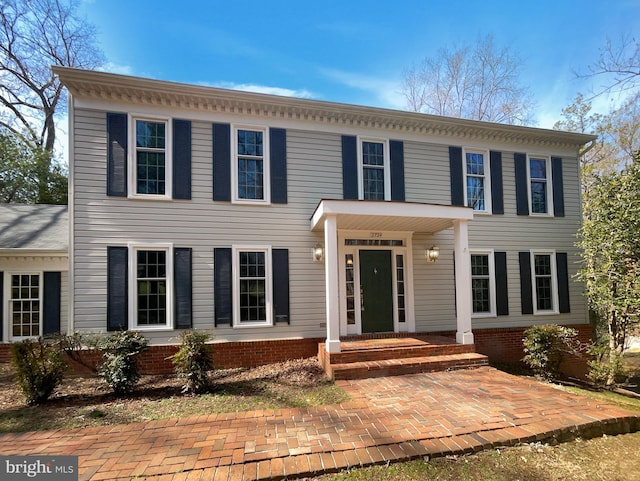 view of front of property with brick siding