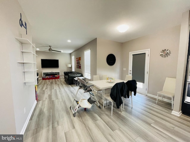 dining room with recessed lighting, a ceiling fan, light wood-style floors, and baseboards