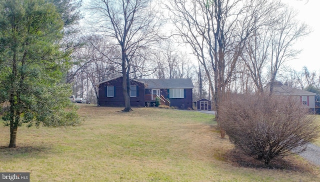 view of front of home featuring a front lawn and crawl space