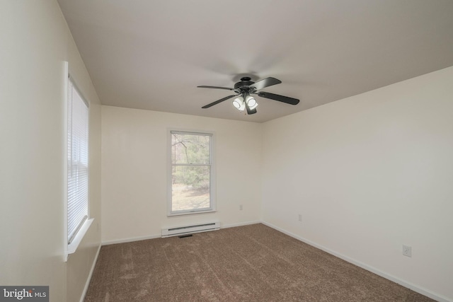 carpeted spare room with a baseboard radiator, baseboards, and ceiling fan