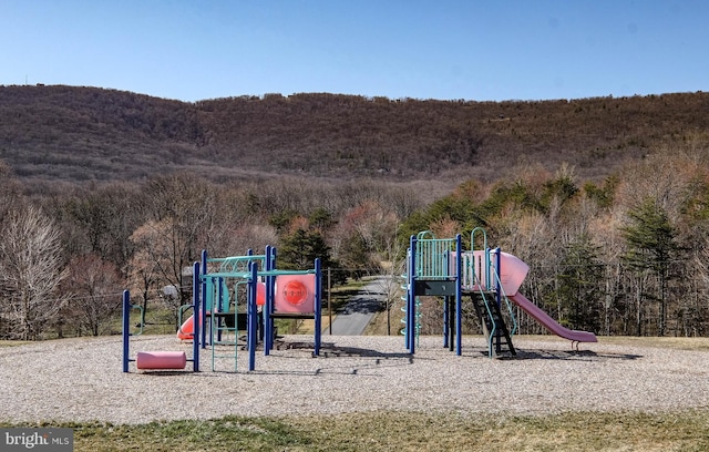 communal playground with a view of trees