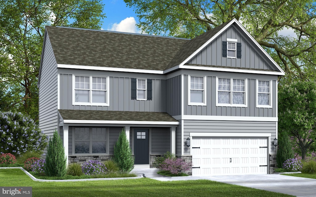 view of front of property with a garage, stone siding, board and batten siding, and roof with shingles