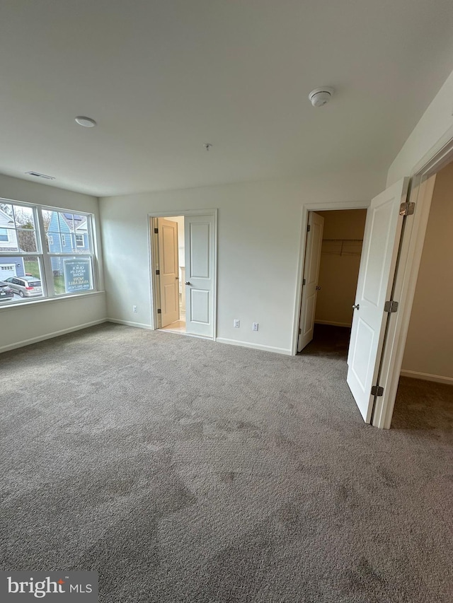 12 Chase Cir, Elkton, MD 21921 - unfurnished bedroom featuring baseboards, carpet floors, and a spacious closet