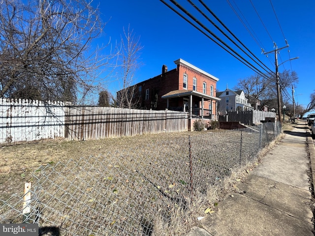 exterior space with fence private yard