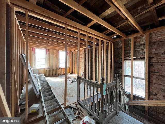 miscellaneous room featuring an upstairs landing