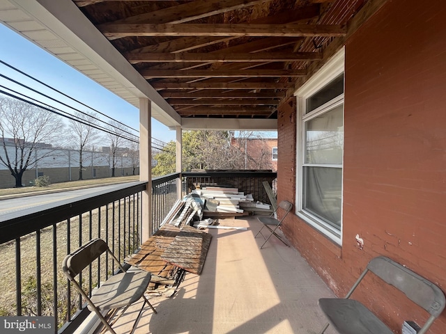 view of patio / terrace with a balcony