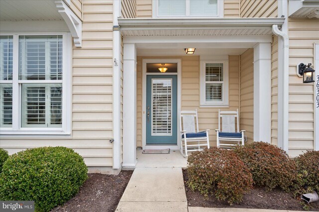 entrance to property with a porch