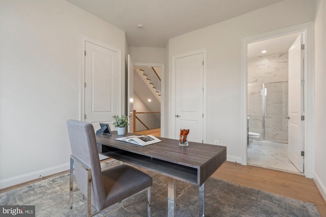 home office featuring recessed lighting, baseboards, and wood finished floors