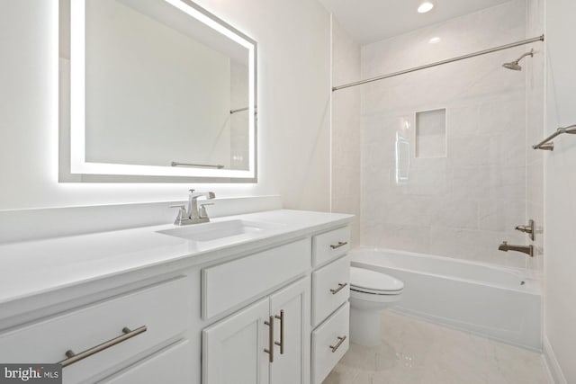 full bath featuring toilet, marble finish floor, recessed lighting,  shower combination, and vanity