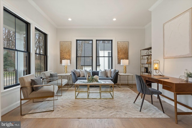 home office with crown molding, wood finished floors, and baseboards