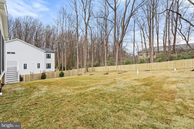 view of yard with fence