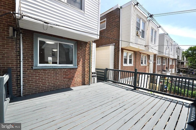 wooden deck with a residential view