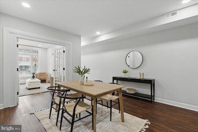 dining space featuring recessed lighting, visible vents, baseboards, and wood finished floors