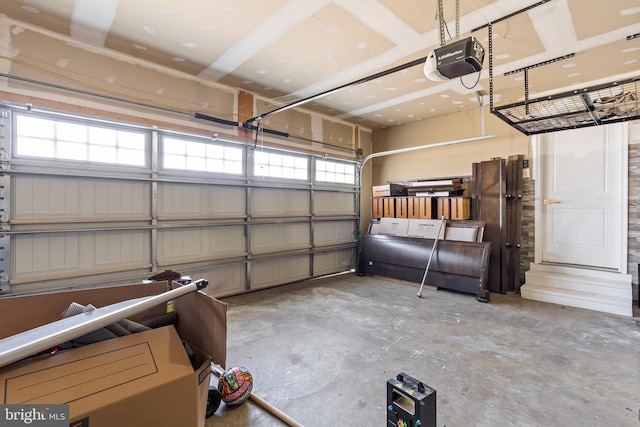 garage featuring a garage door opener