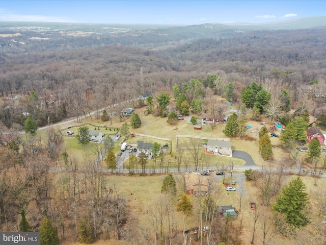 drone / aerial view with a view of trees