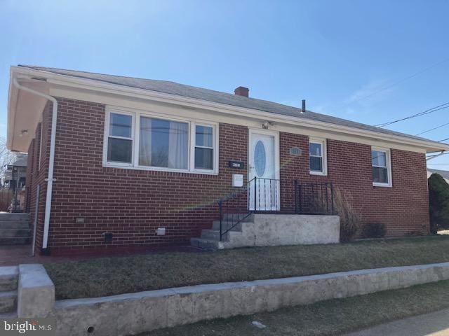 view of front facade with brick siding