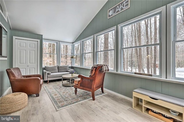 sunroom / solarium with lofted ceiling