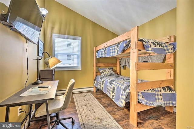 bedroom featuring a baseboard radiator, lofted ceiling, and wood finished floors