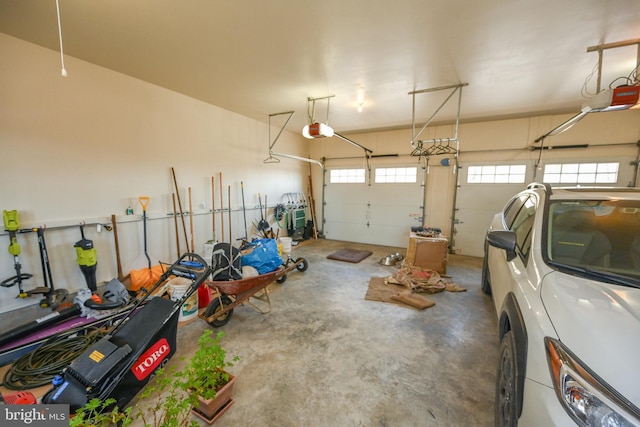 garage featuring a garage door opener